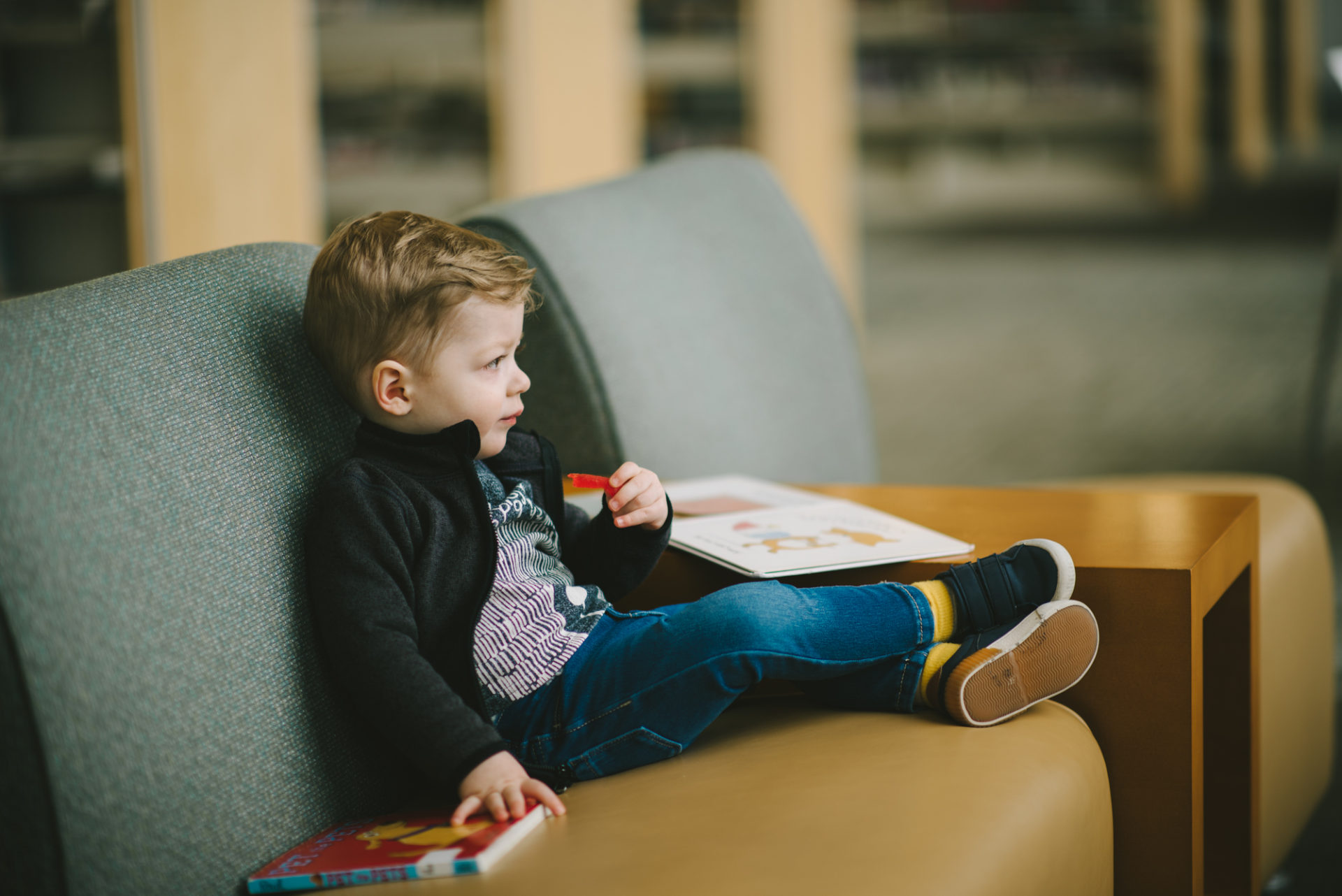 He's two! Reading books at the library.