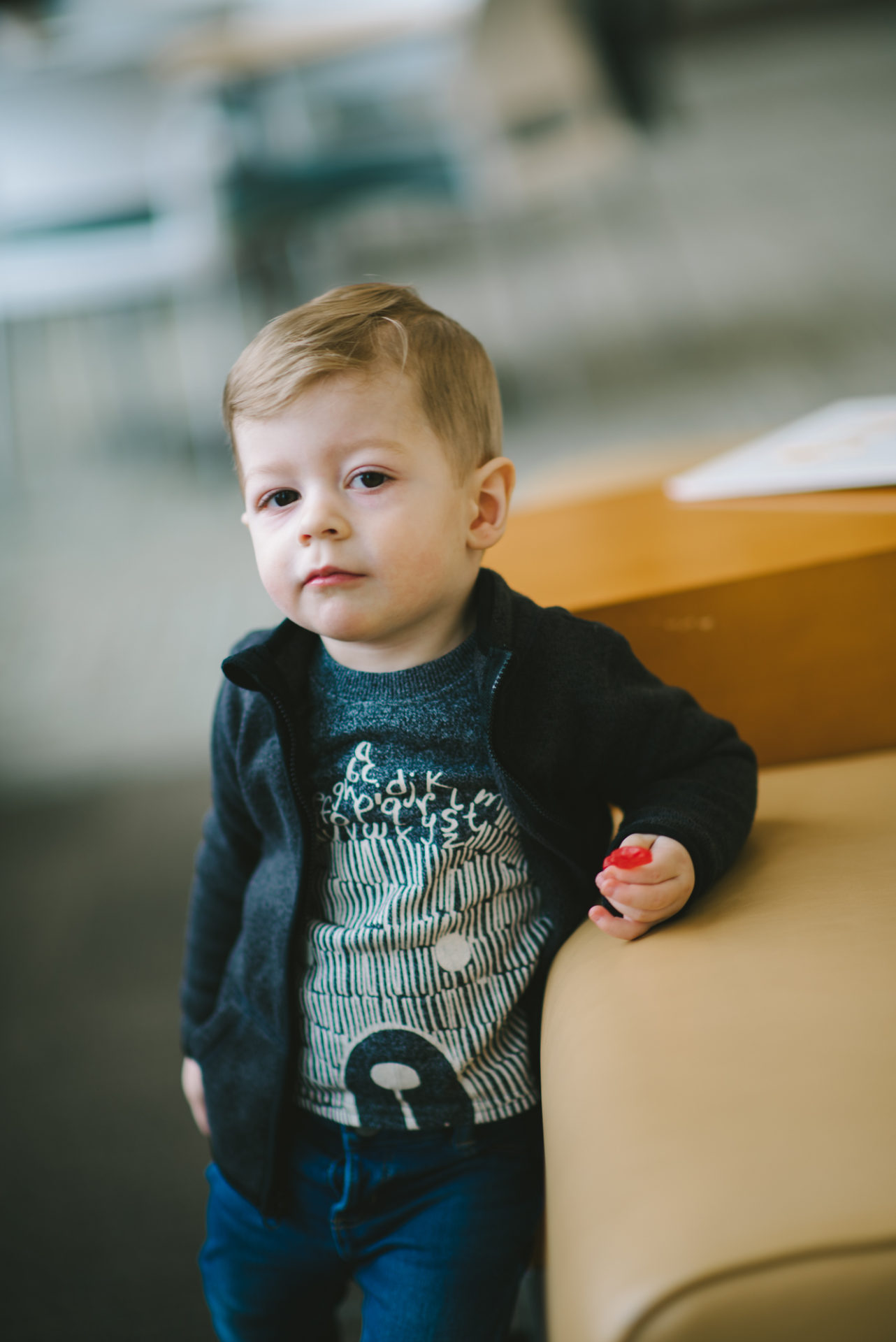 He's two! Reading books at the library.