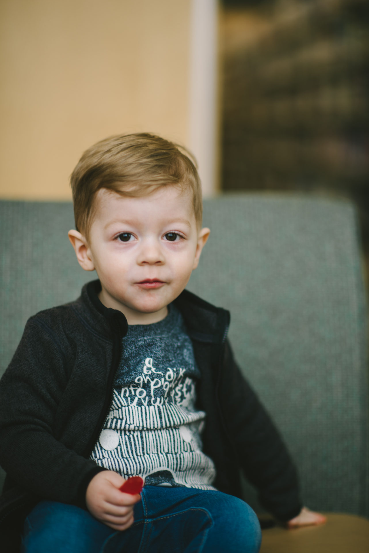 He's two! Reading books at the library.